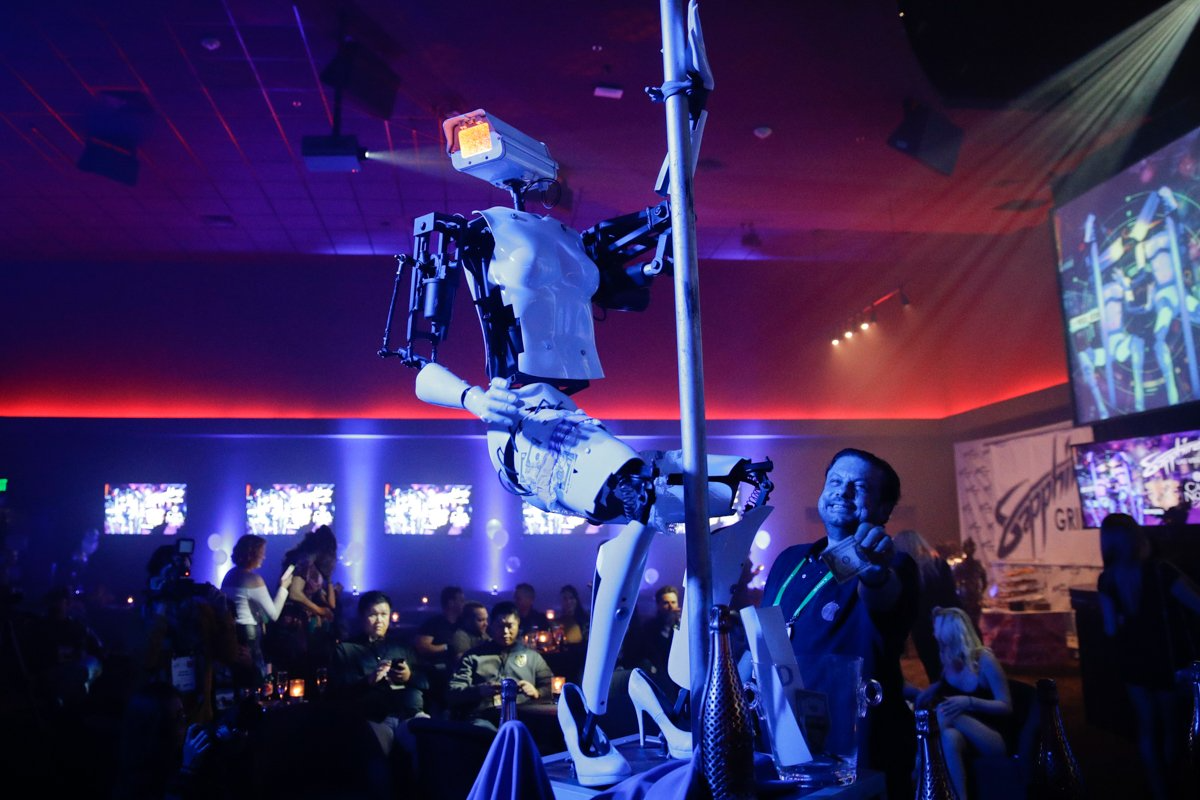 A pole-dancing robot built by British artist Giles Walker performs at a gentlemen's club.